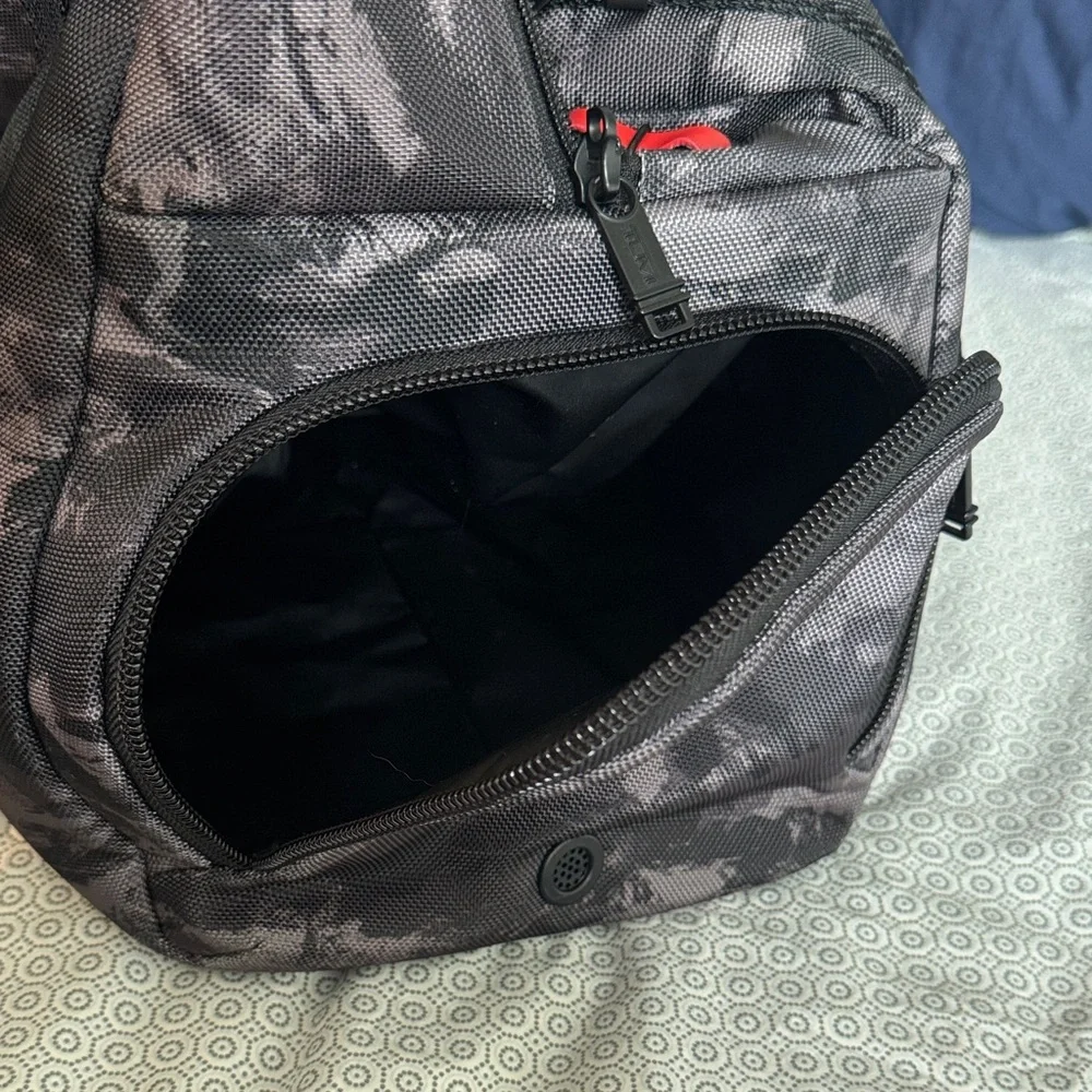 Tumi Black Camo Duffel Bag with Red Interior